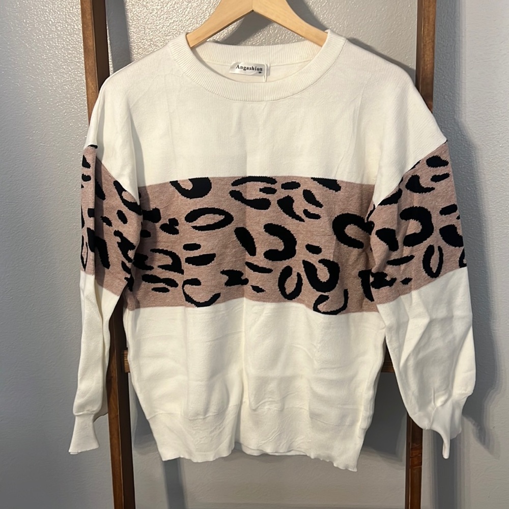 White and leopard sweater